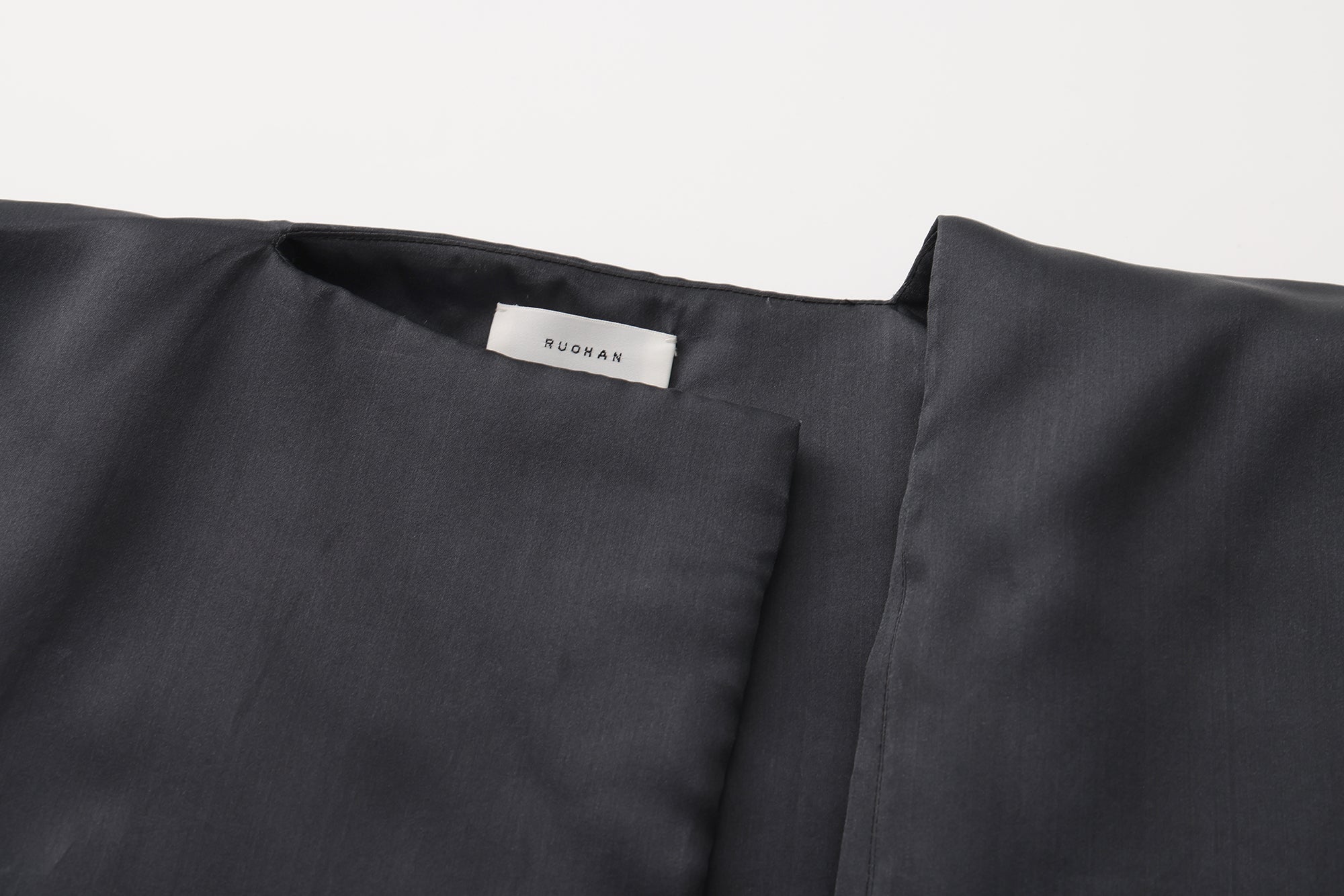 AW25 - INK PADDED MAUKE CAPE