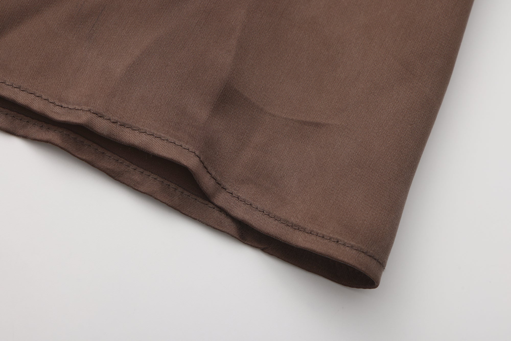 SS26 - COGNAC ASSU BIAS CUT SKIRT